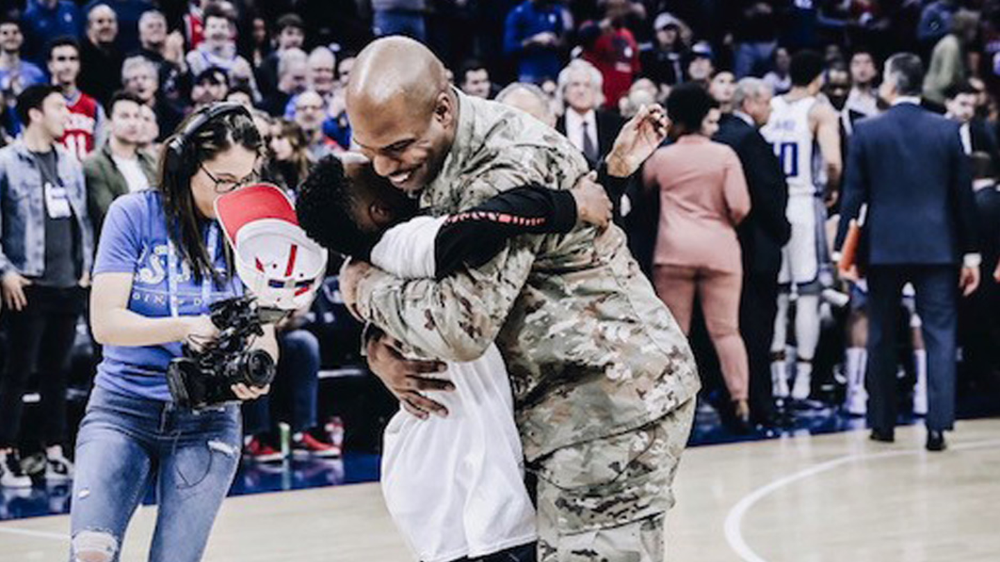 Ivan Thomas coming home from an 18 month deployment and surprising his son at a Sixers Basketball Game